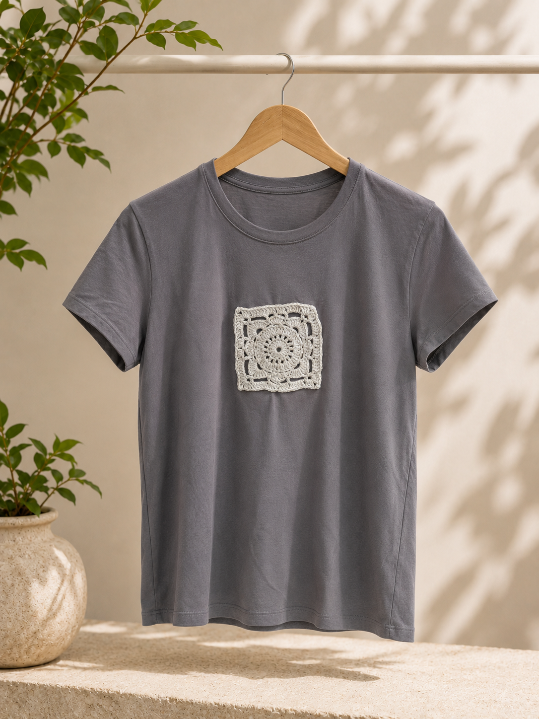 grey shirt with hand made detail