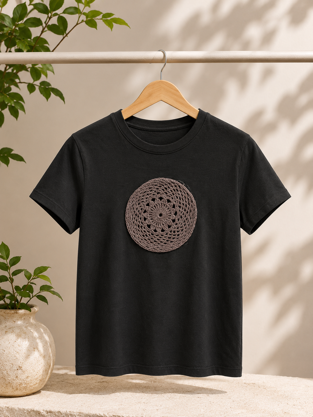 black tshirt with hand made details
